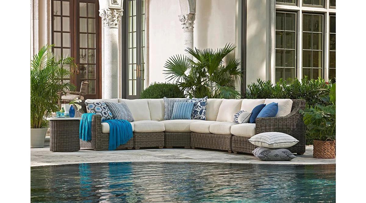 Understated and refined outdoor spaces are effortless with the Oasis Sectional Collection.