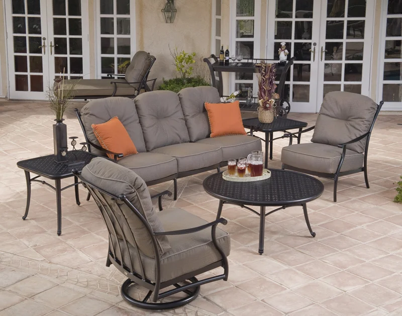 Seville Collection sofa, swivel rocker lounge chair and lounge chair with Napa coffee table and end table.