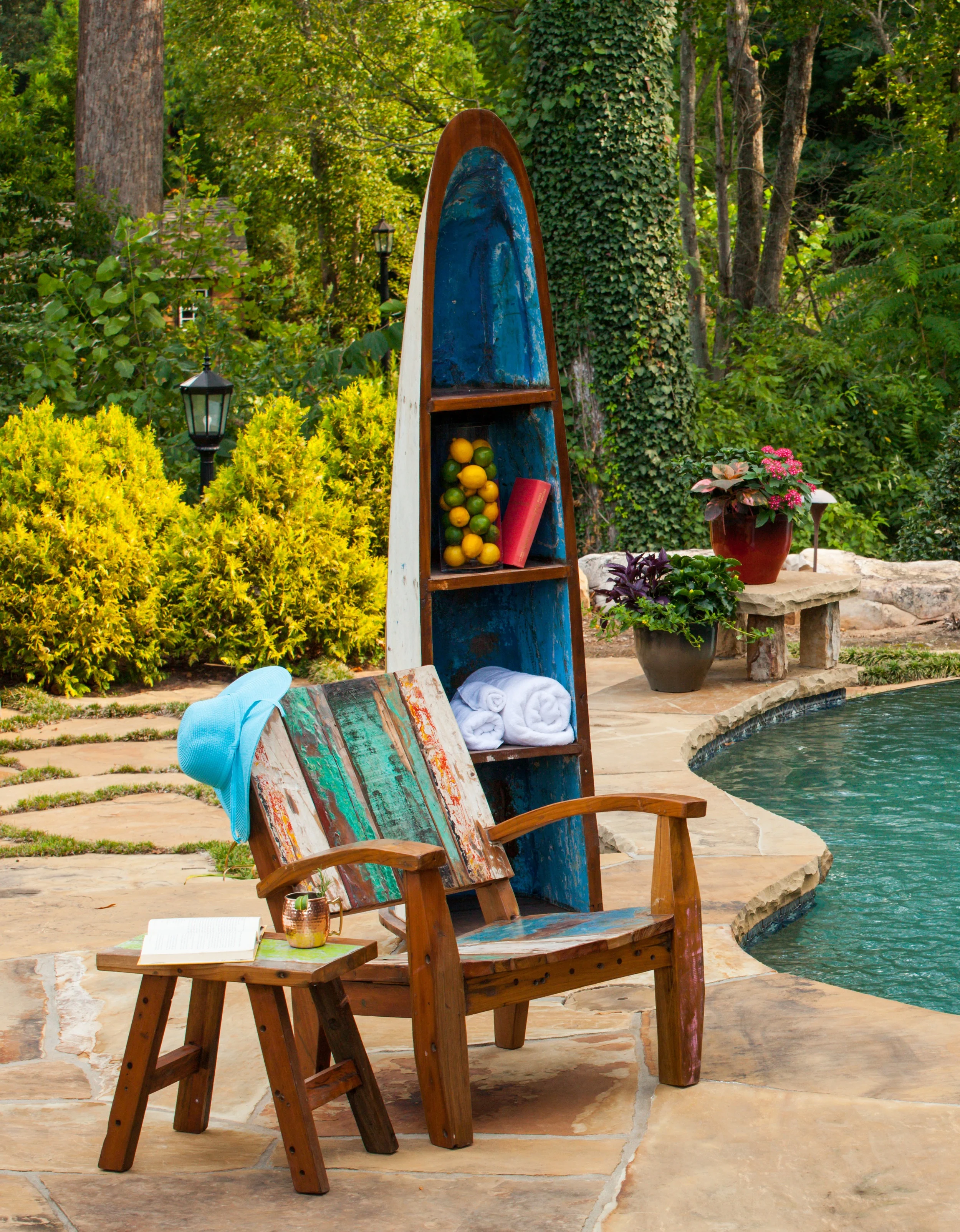 The Max Chair is comfortable and heavy enough not to blow around in bad weather. It doesn’t have a problem with wet bathing suits either. The Boat Rack has plenty of storage room for towels and sunscreen or anything else you need to relax by the pool.