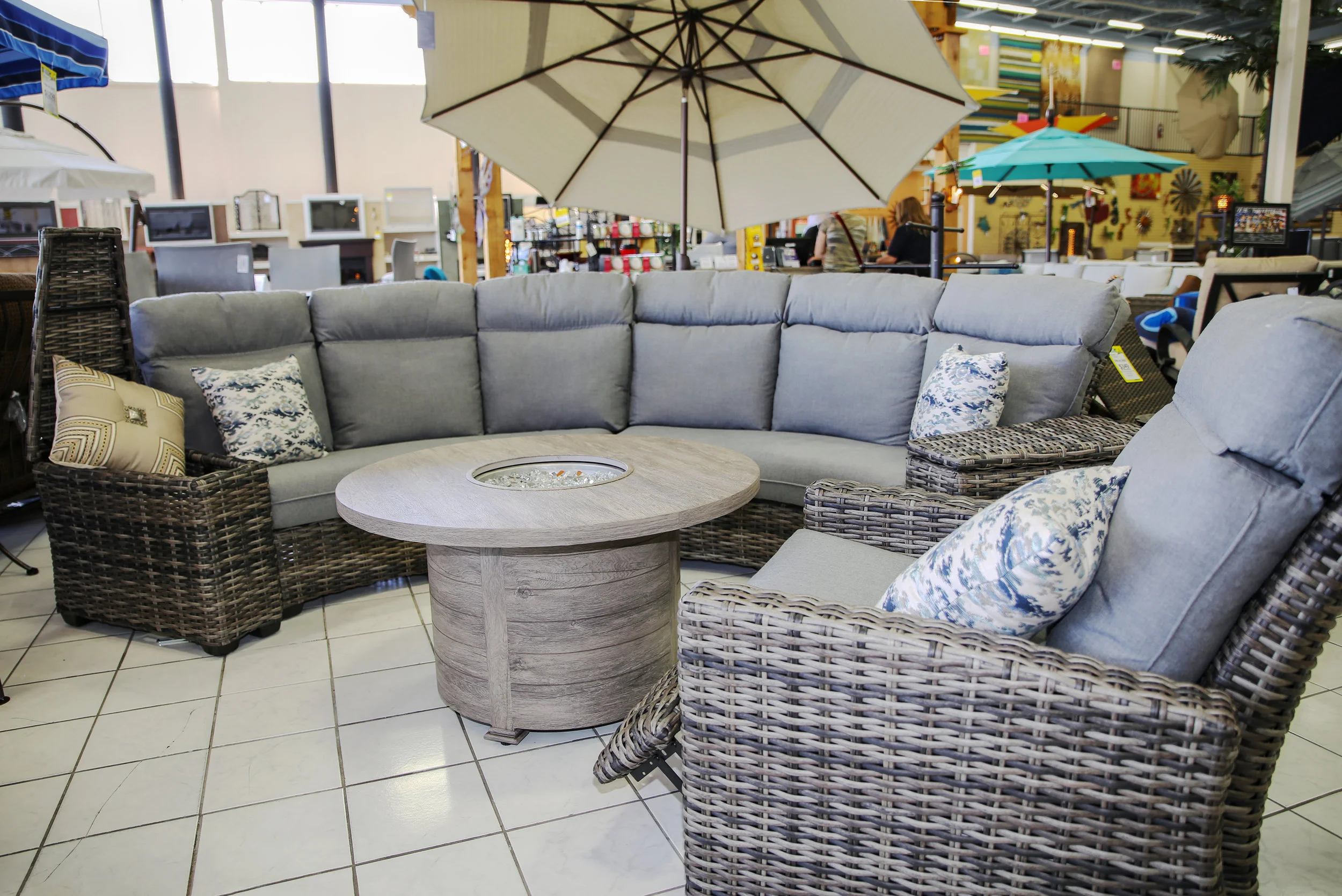 Wicker Curved Sectional so you can make it as big as you want. Stocked in both Grey and Brown
