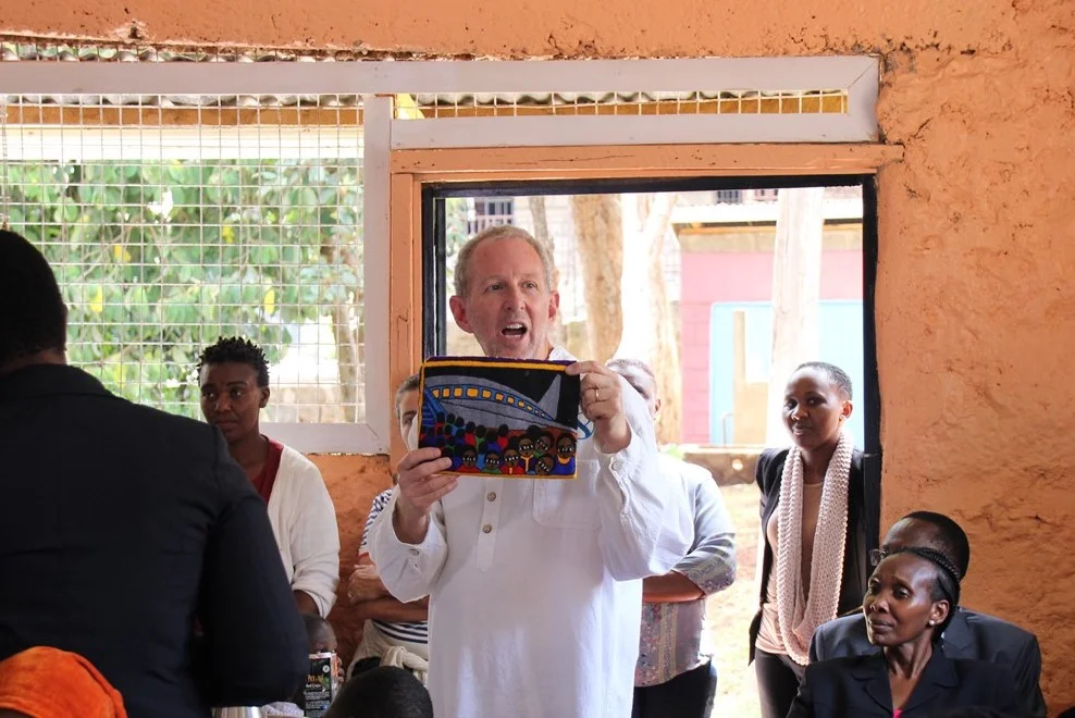 My parents bought this Afikomen holder from an Ethiopian vendor in Israel a few decades ago. On one side, it portrays a Jewish village in Africa. On this side, a representation of the planes that airlifted the community to Israel in the 1980's and 1…