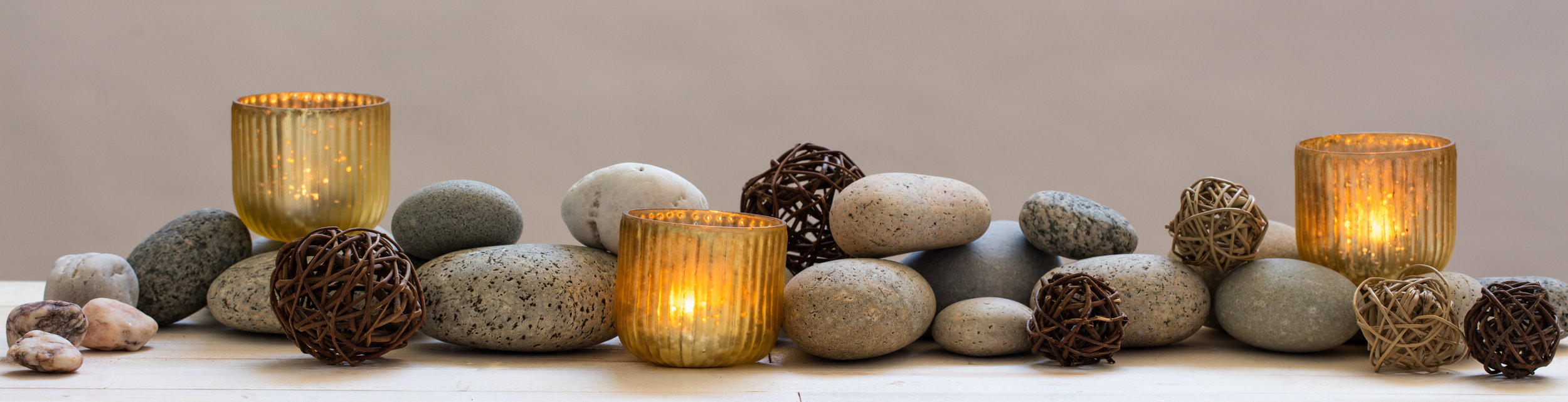 AdobeStock pd_170849253 - horiz stones and candles.jpeg