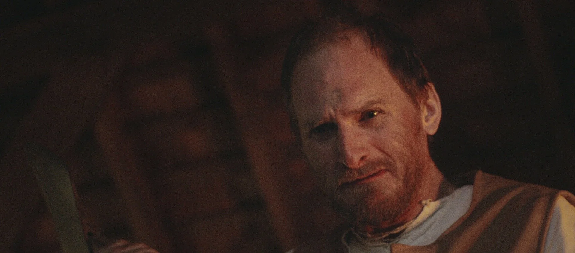 Carey Thring as John Grimston