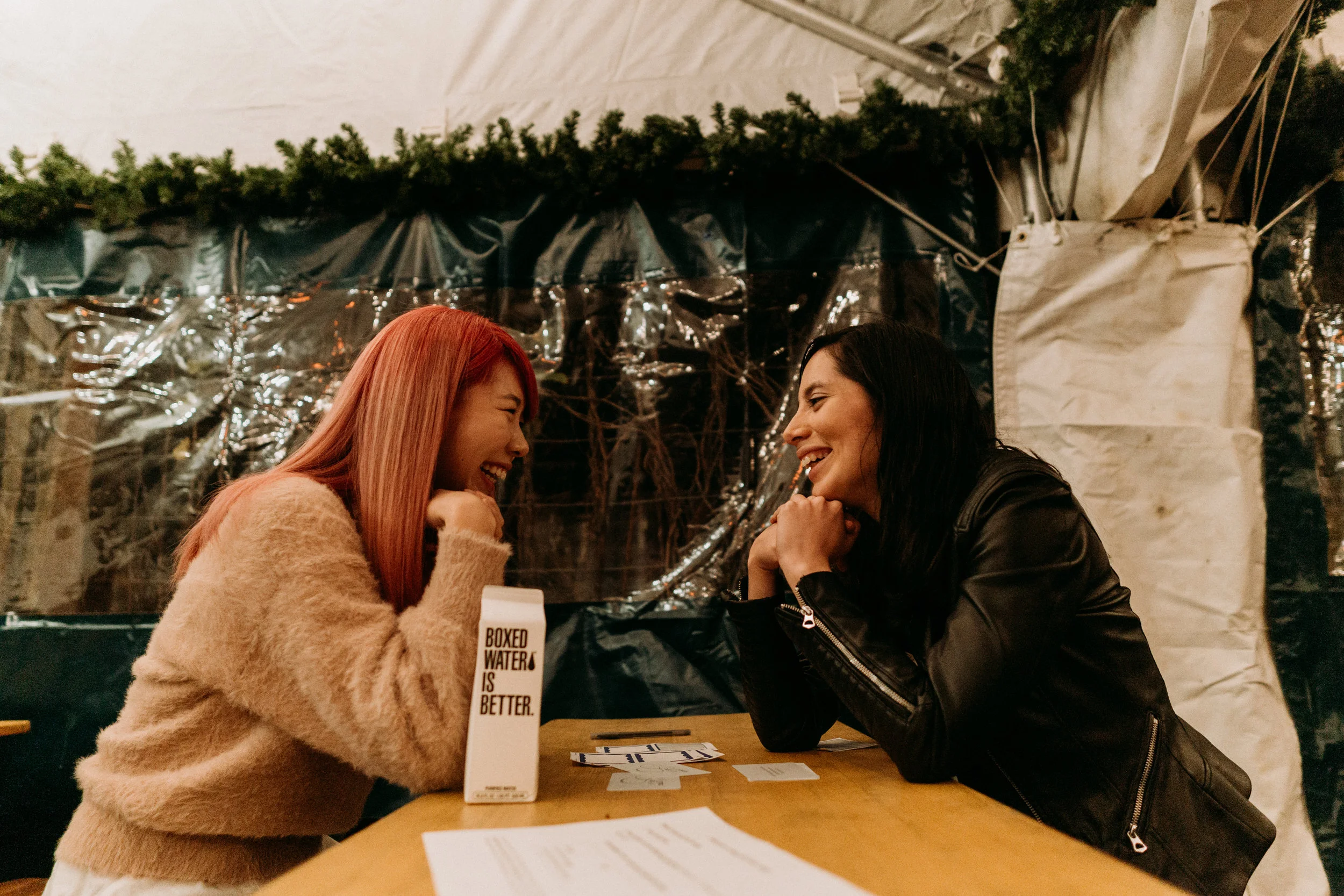 Two participants share a laugh during one of the rounds of Skip The Small Talk. Although most of the questions are serious, there’s no lack of a sense of humor sharing things about your life.