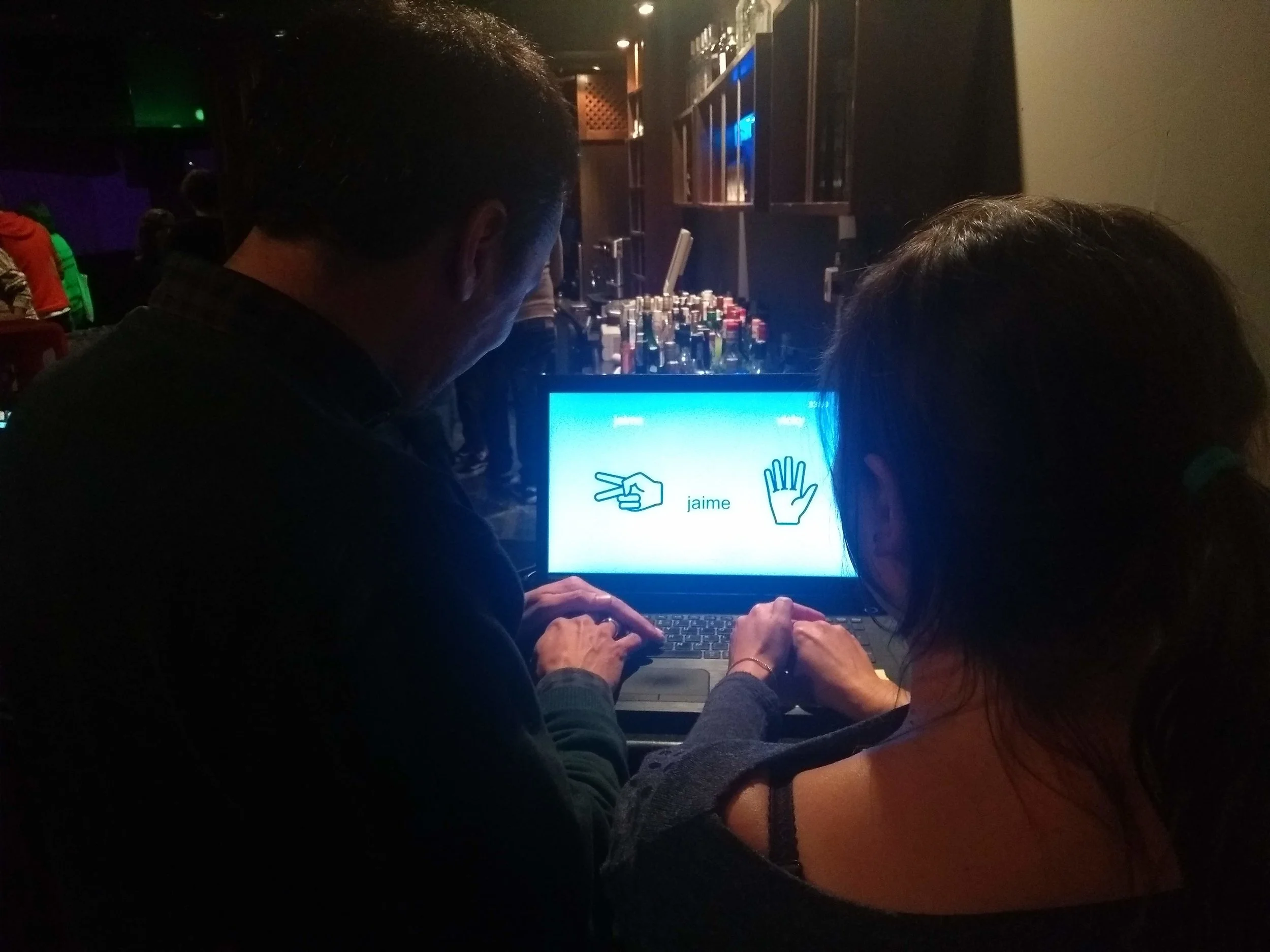 Jaime and Vicky playing rock-paper-scissors, BCB Lab edition