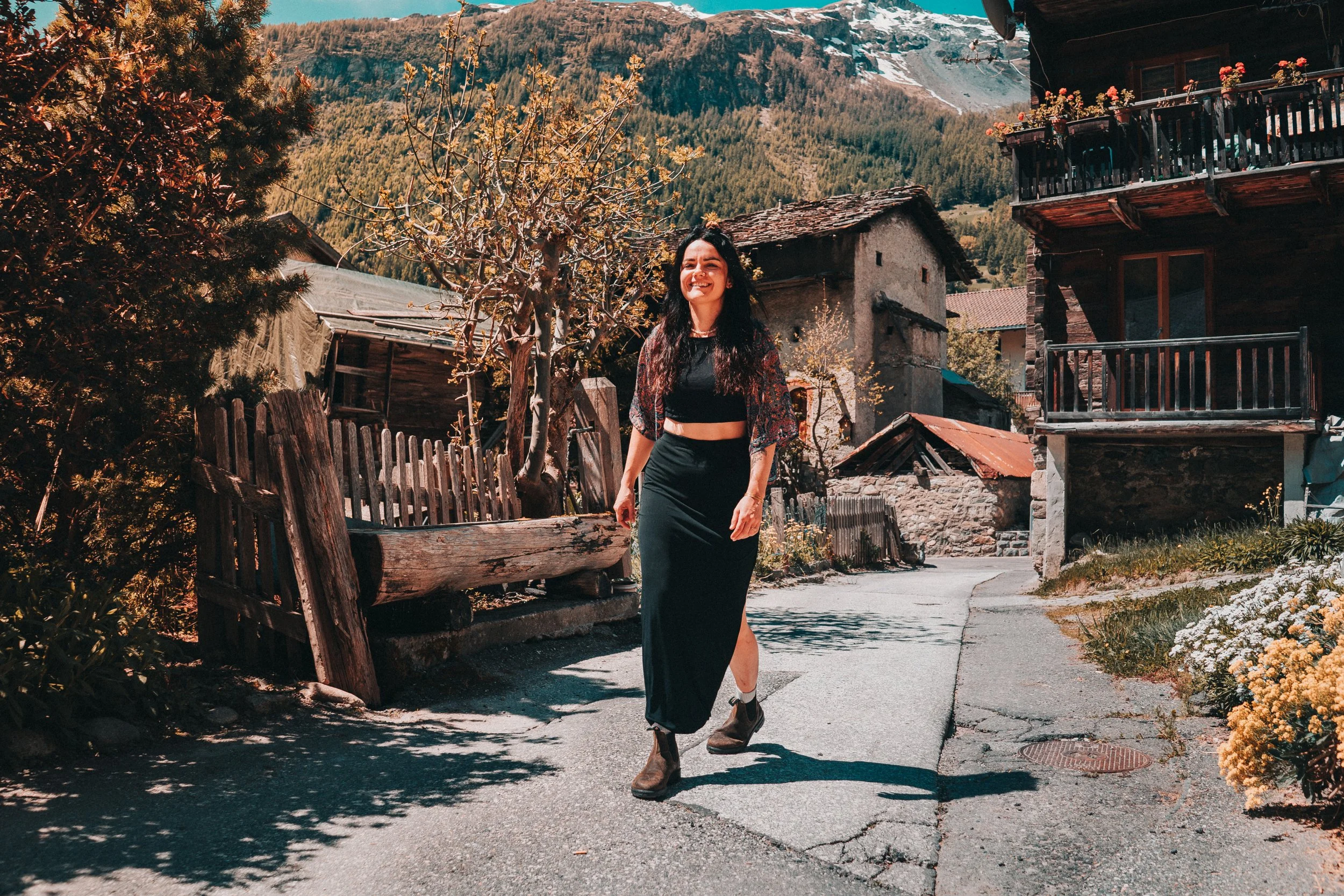 Woman during a photo shoot in the traditional Alpine village of Evolène, Switzerland.