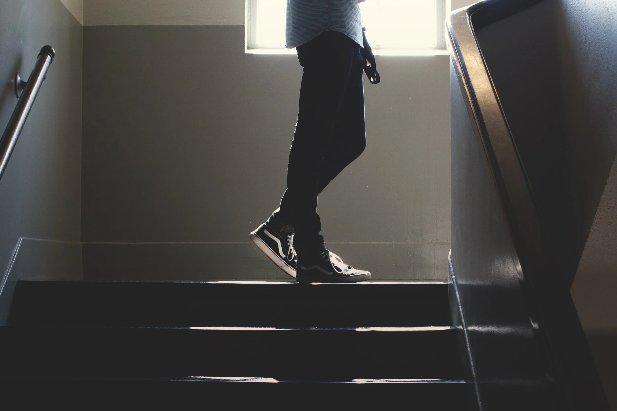 Student in stairwell by Ryan Tauss.jpg