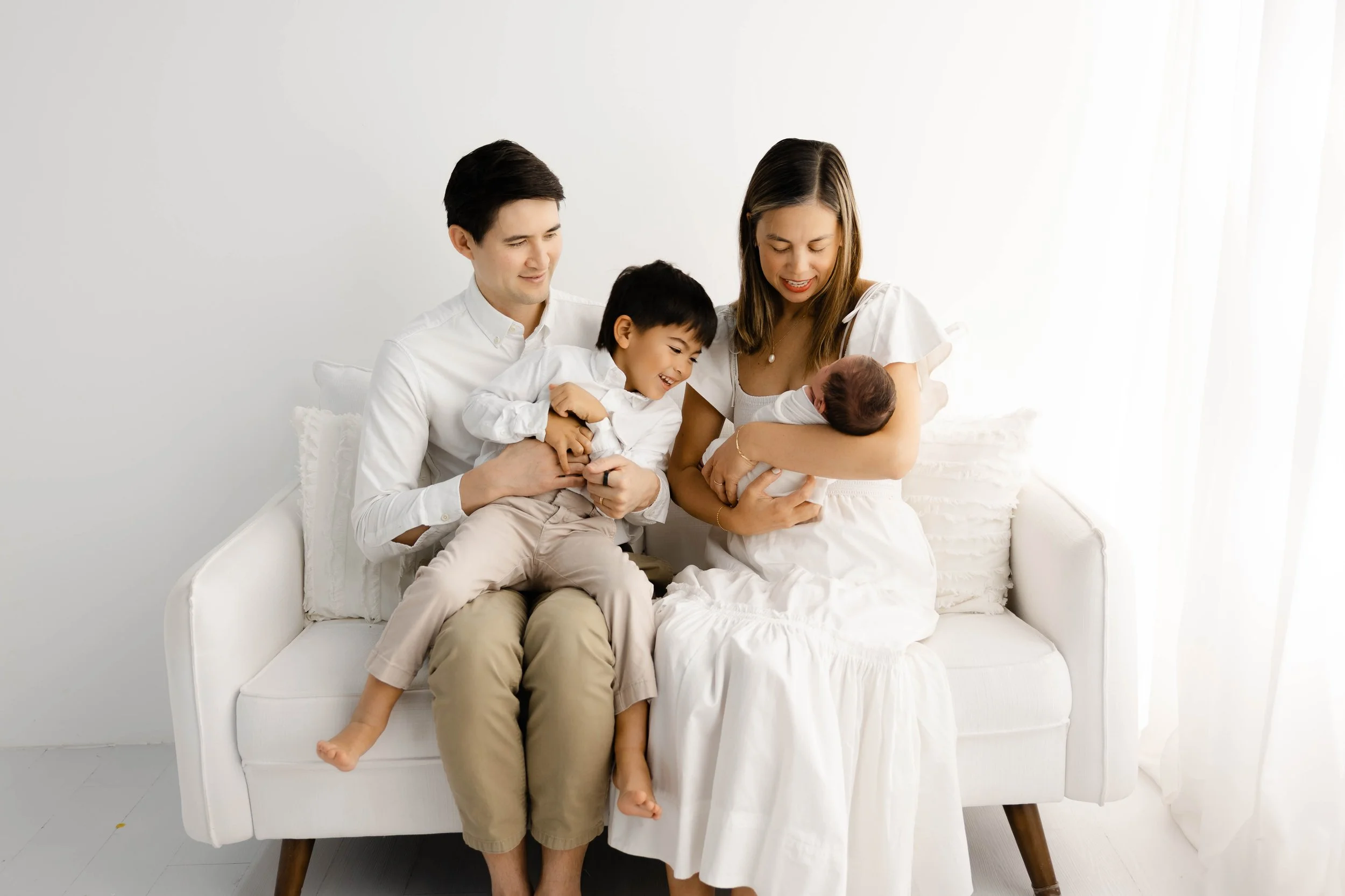 What to Wear for Newborn Photos | Raleigh Studio Guide