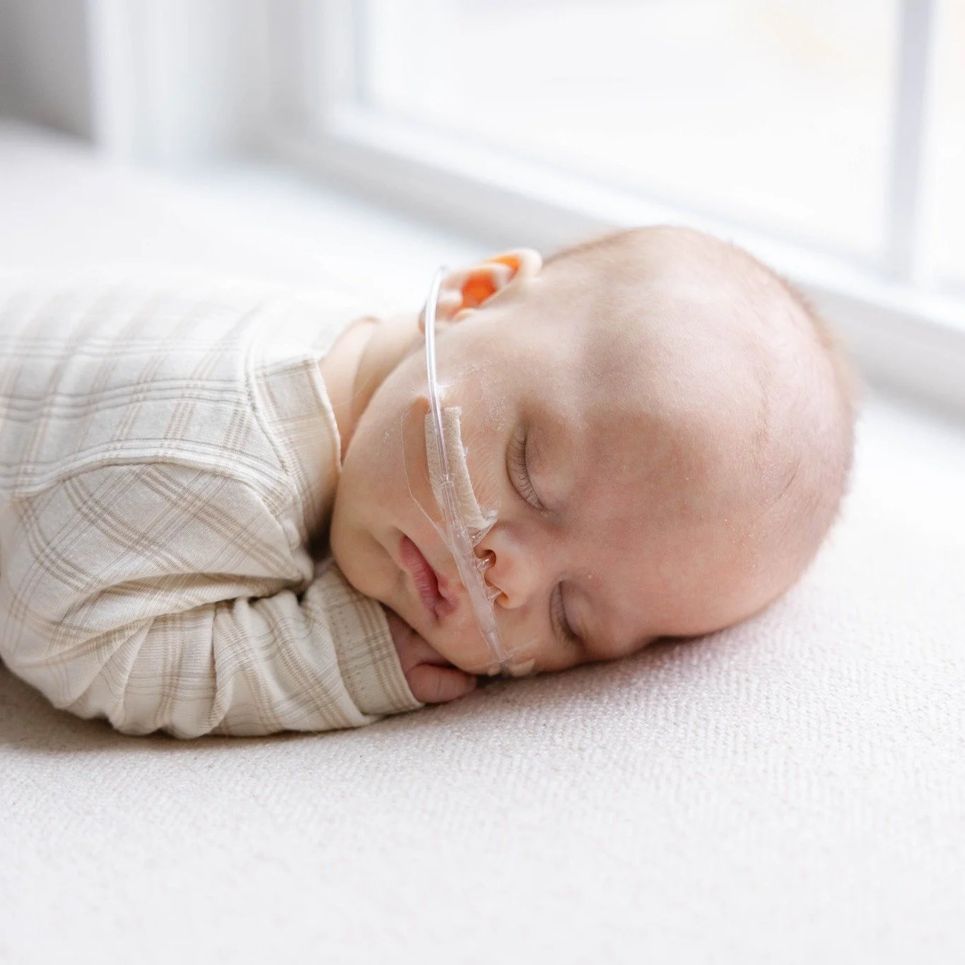 Every newborn story looks a little different.  This sweet boy is the third baby in his family, already so deeply loved by his big brother and sister. His session didn&rsquo;t happen on a timeline&mdash;it happened when he was ready, after an unexpect