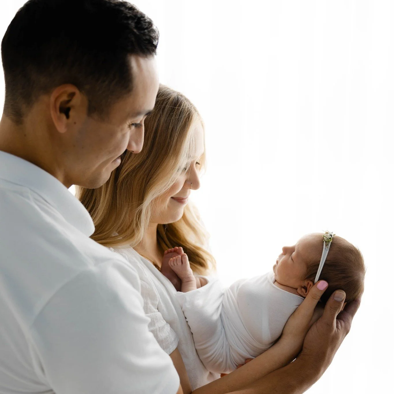 Studio Tip for a Newborn Session: If you live within 30 minutes of the studio, try to feed baby before you leave.  If you live further away, you are welcome to feed once you get to the studio.  Sometimes after eating, babies can be alert and need a l