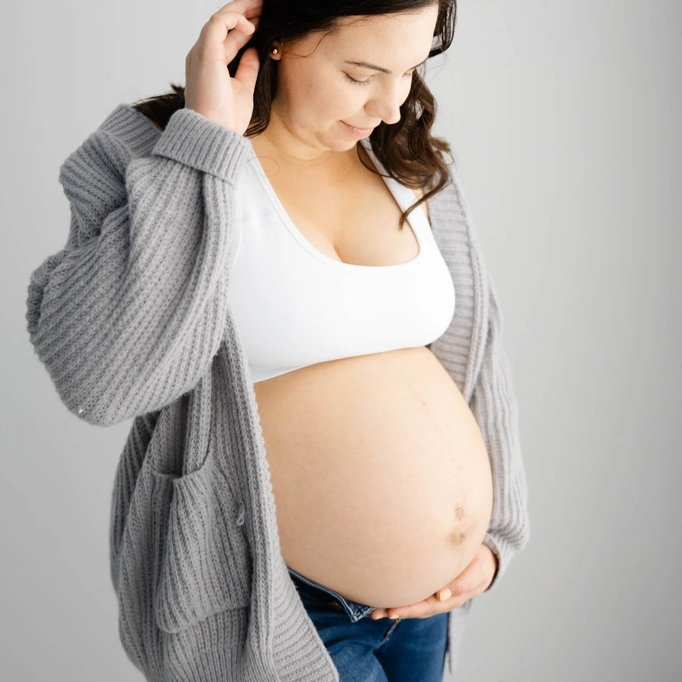 Ugh, I love an exposed pregnant belly. I feel like this generation really embraces the beauty of pregnancy and showing off the bump. When I was pregnant with my first two, it felt more like &lsquo;hide that thing under the biggest moo moo you can fin
