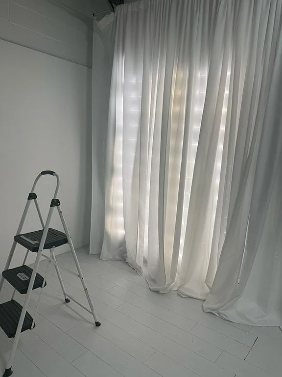 End Result of a DIY LED Light Wall in All White Studio