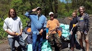 We work as a team cleaning our community with our street friends.