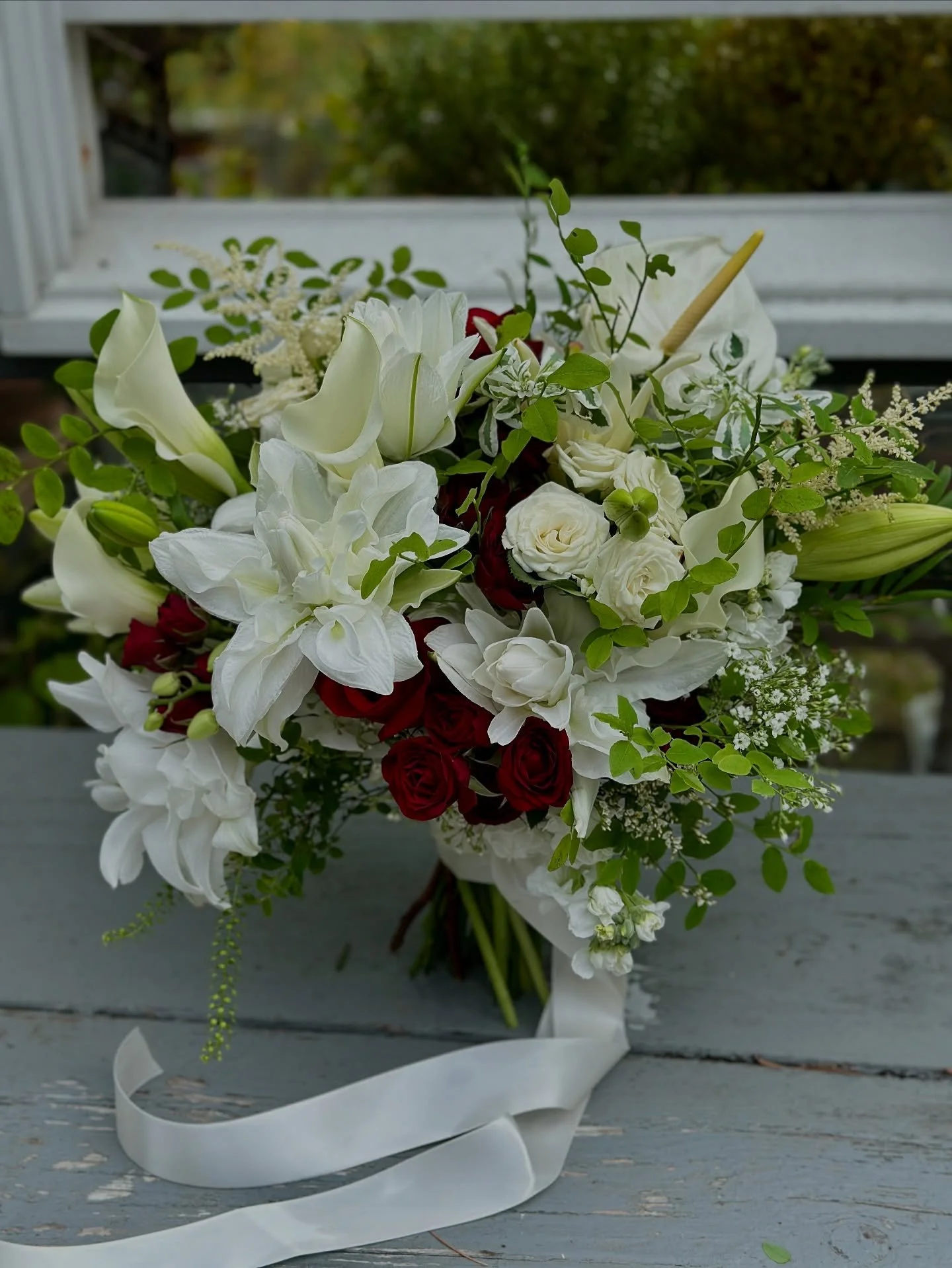 Can&rsquo;t wait to see pro photos! This charming bouquet has 3 types of lilies, 2 different orchids, 3 different roses and foraged greens. #busysaturday #summerevents #seaviewmanor bride
