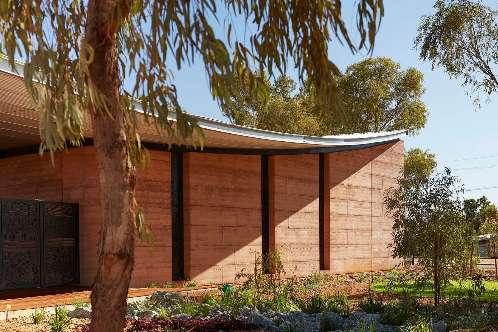 Rammed earth and curved roof
