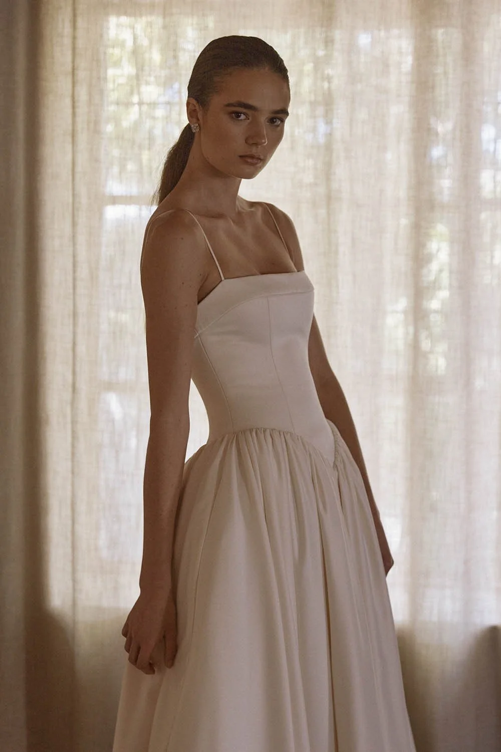 Anais by Vagabond Bridal, Available exclusively at The Art of Bridal boutique in Brisbane, Queensland. Perfect for brides searching for a satin wedding dress that feels understated yet refined, Anaïs is ideal for those drawn to modern minimalist brid