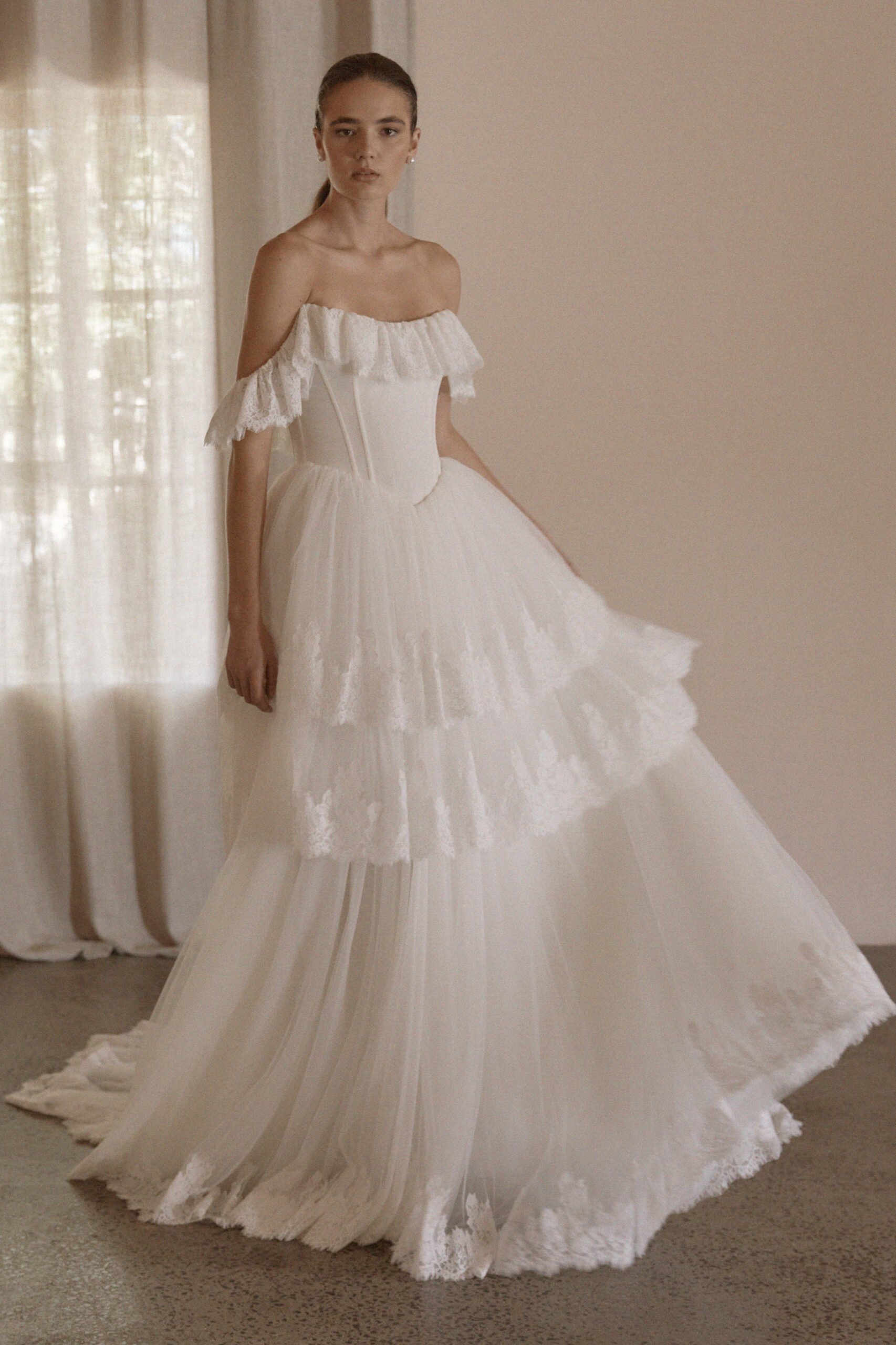 Juliette by Vagabond Bridal, available exclusively at The Art of Bridal bridal boutique, Brisbane, Queensland. Juliette is a feminine ode to softness — a romantic Italian tulle gown that drapes with ethereal lightness and moves like a breath of air. 