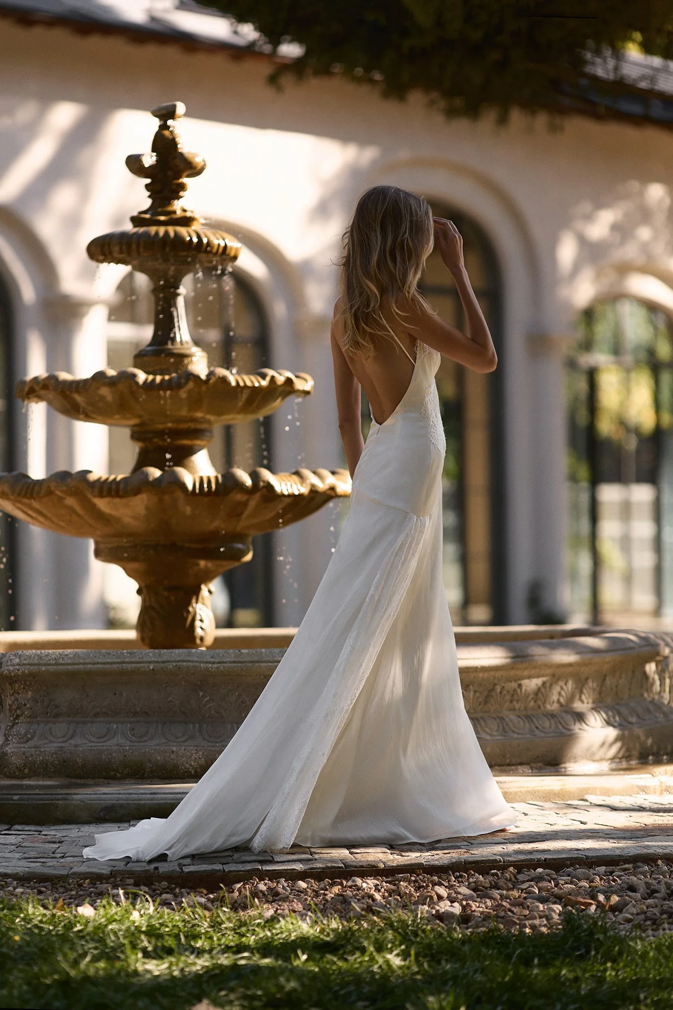 Martina by Romanova Atelier available at The Art of Bridal exclusively in Australia. Chiffon, v-neck style with romantically soft shape.