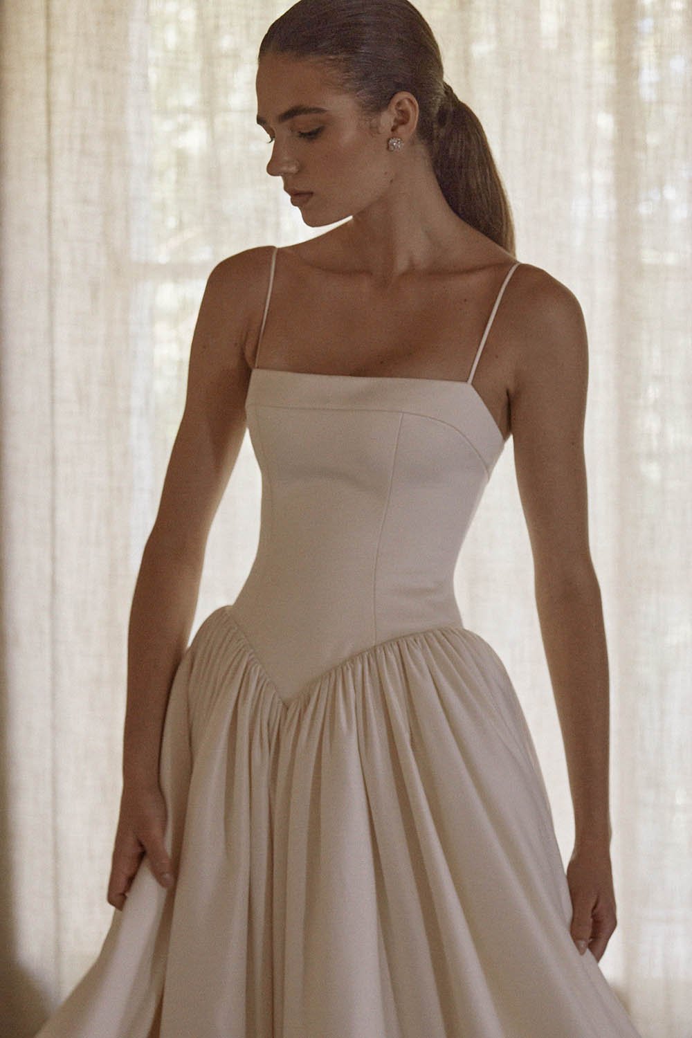 Anais by Vagabond Bridal, Available exclusively at The Art of Bridal boutique in Brisbane, Queensland. Perfect for brides searching for a satin wedding dress that feels understated yet refined, Anaïs is ideal for those drawn to modern minimalist brid
