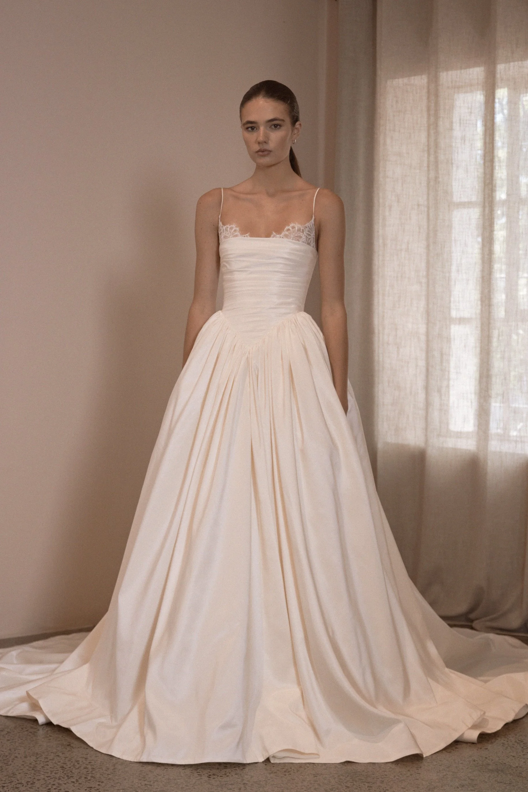 Meet Sylvie by Vagabond Bridal - a beautifully considered wedding gown that captures the effortless romance and modern femininity synonymous with Vagabond Bridal. Designed for the bride who wants to feel refined yet unmistakably herself, Sylvie balan