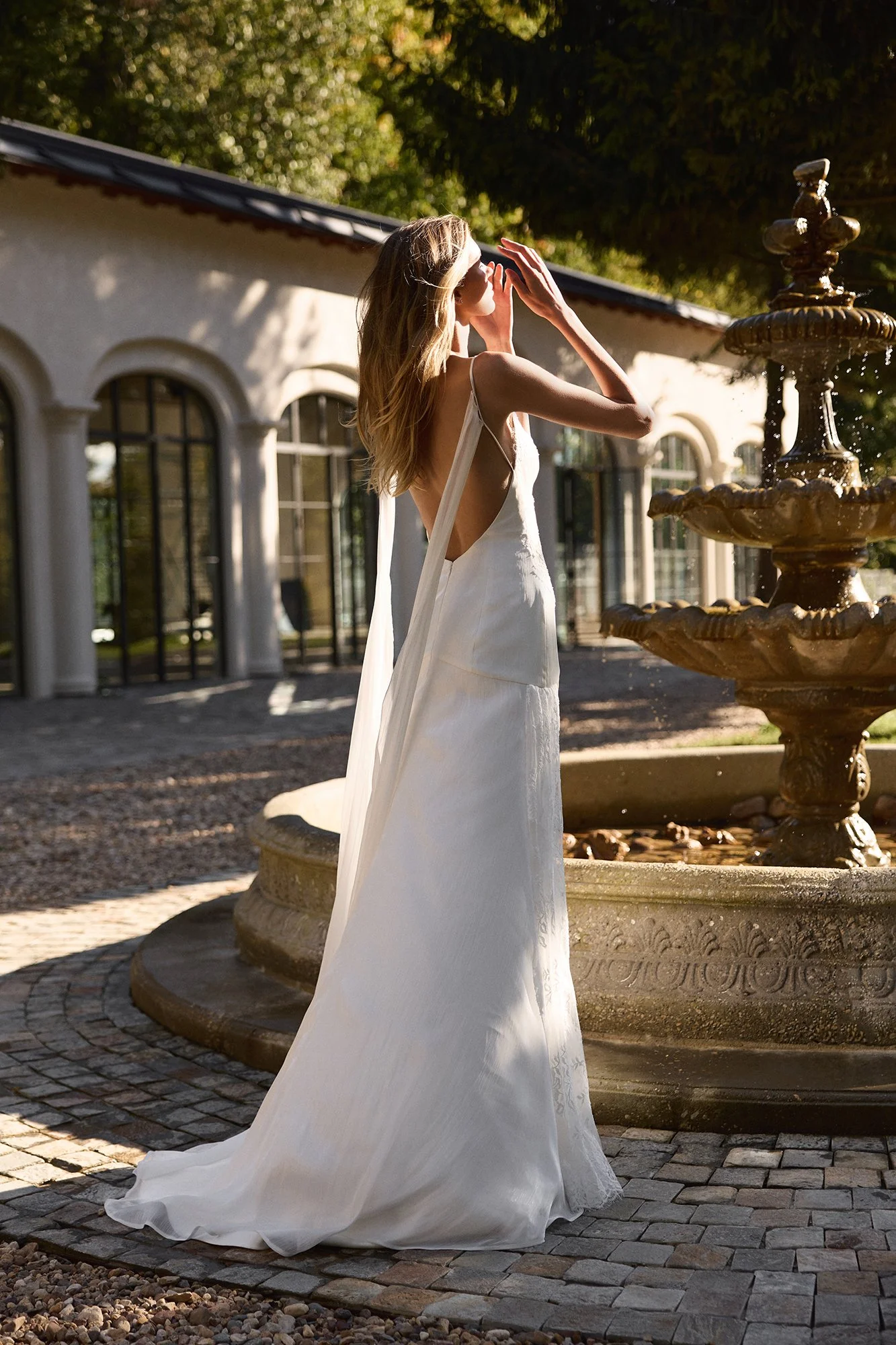 Martina by Romanova Atelier available at The Art of Bridal exclusively in Australia. Chiffon, v-neck style with romantically soft shape.