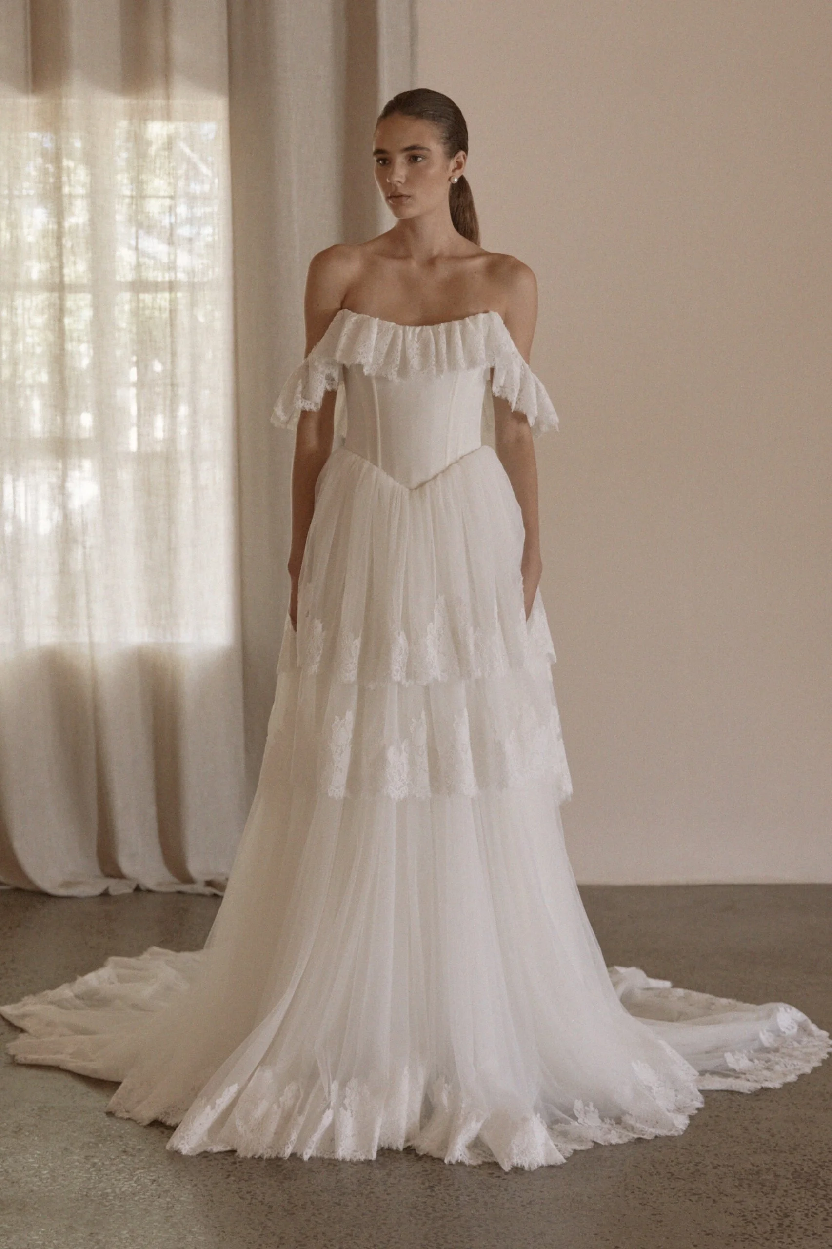 Juliette by Vagabond Bridal, available exclusively at The Art of Bridal bridal boutique, Brisbane, Queensland. Juliette is a feminine ode to softness — a romantic Italian tulle gown that drapes with ethereal lightness and moves like a breath of air. 