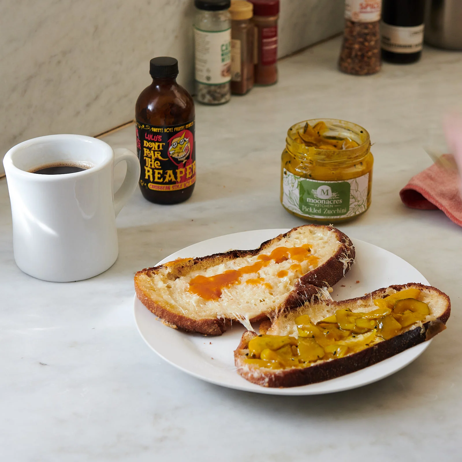 Sourdough, Heidi Farm Tilsit, Lulu’s hot sauce and Moonacres Pickled Zucchini. Butter. Oil. Butter. Tick.