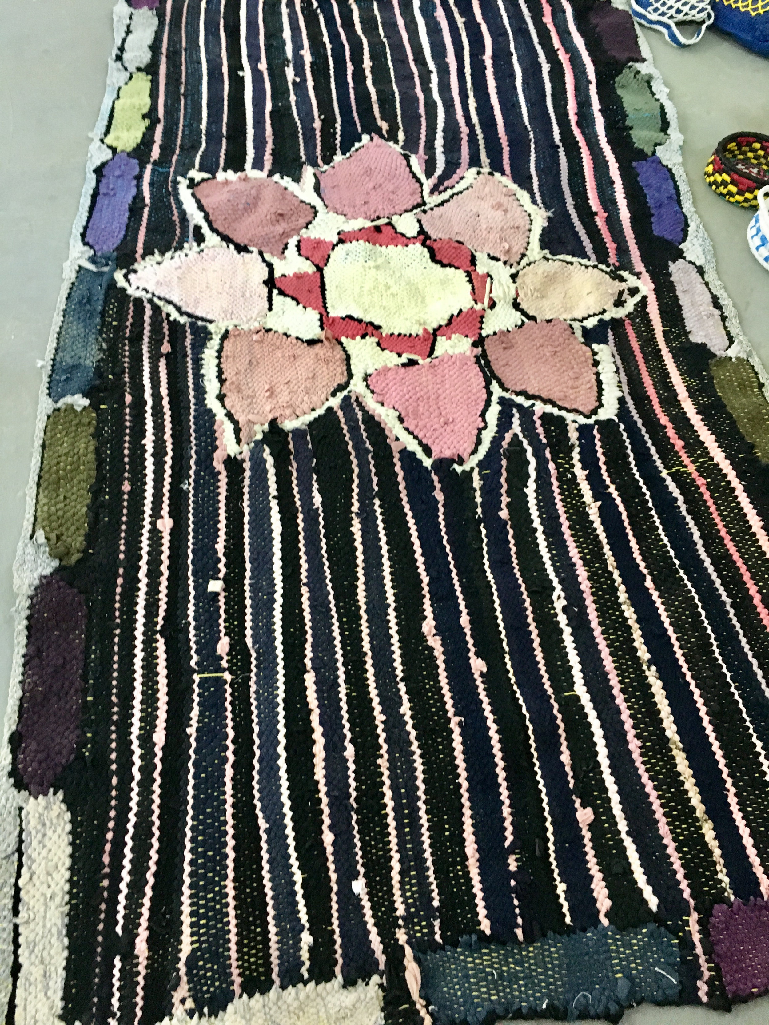 Rug making from recycled clothes UN Women
