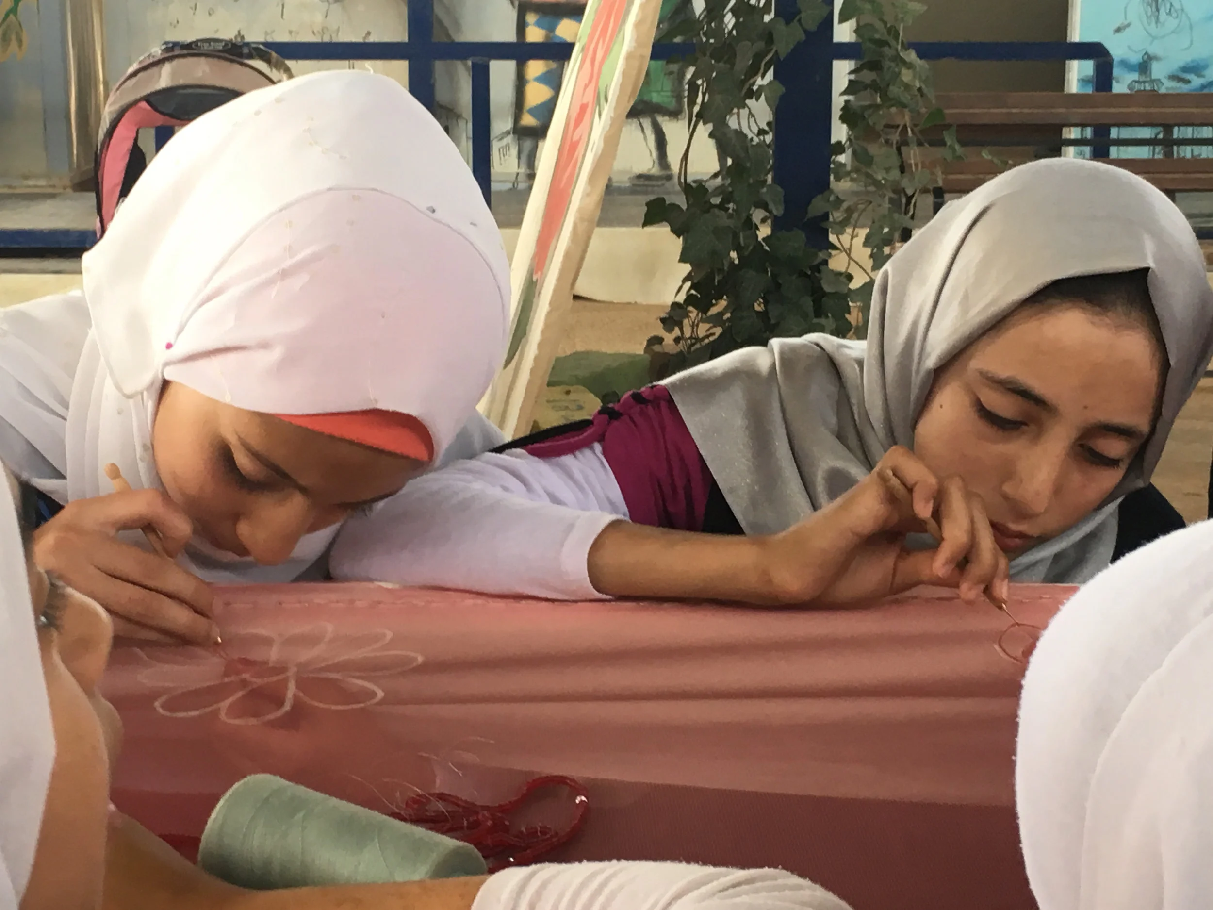  Tiger Girls concentrating on their new embroidery skills 