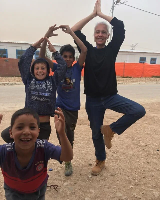 The boys are full of super nature - in each,seemingly the energy of 5 others.

Minutes before the storm came in they ran towards us &amp; spontaneously picked up where we had left off with our impromptu street yoga of last year - blown off balance on