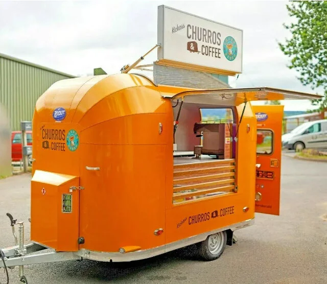 Rocket caravans churro and coffee food trailer with LED vehicle lights