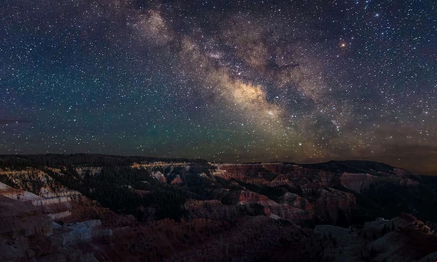 darksky_stock-photo-milky-way-rising-over-cedar-breaks-114906899.jpg
