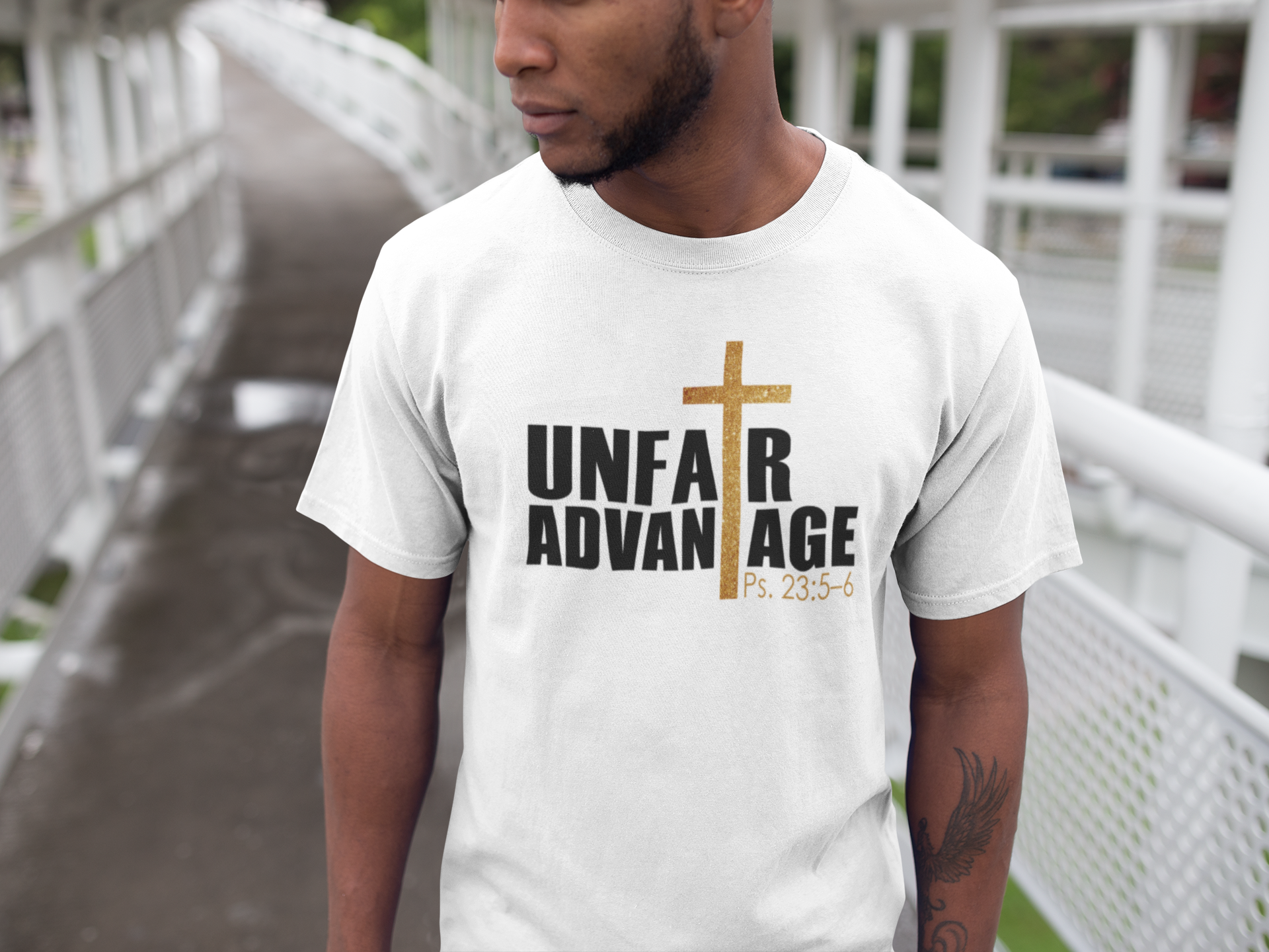 black-man-walking-on-a-bridge-while-wearing-a-round-neck-tee-mockup-a16893.png