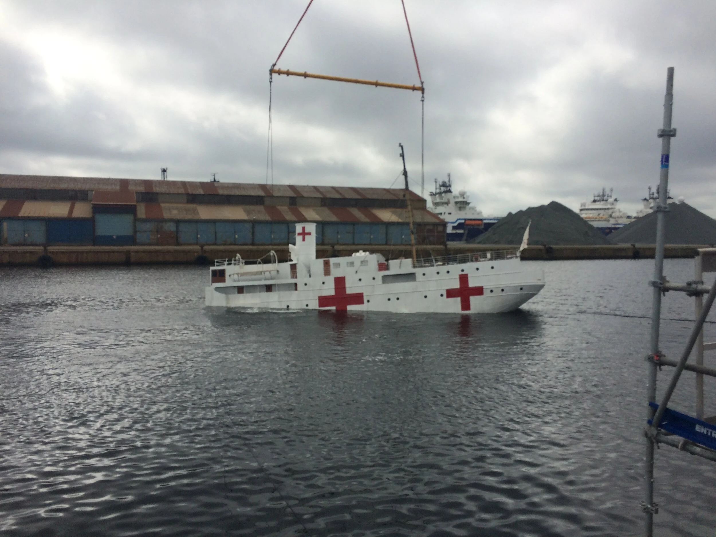  We built a scaled version of the medical ship. Set dec and rigging also built at scale. Crane used to support and sink the vessel. 