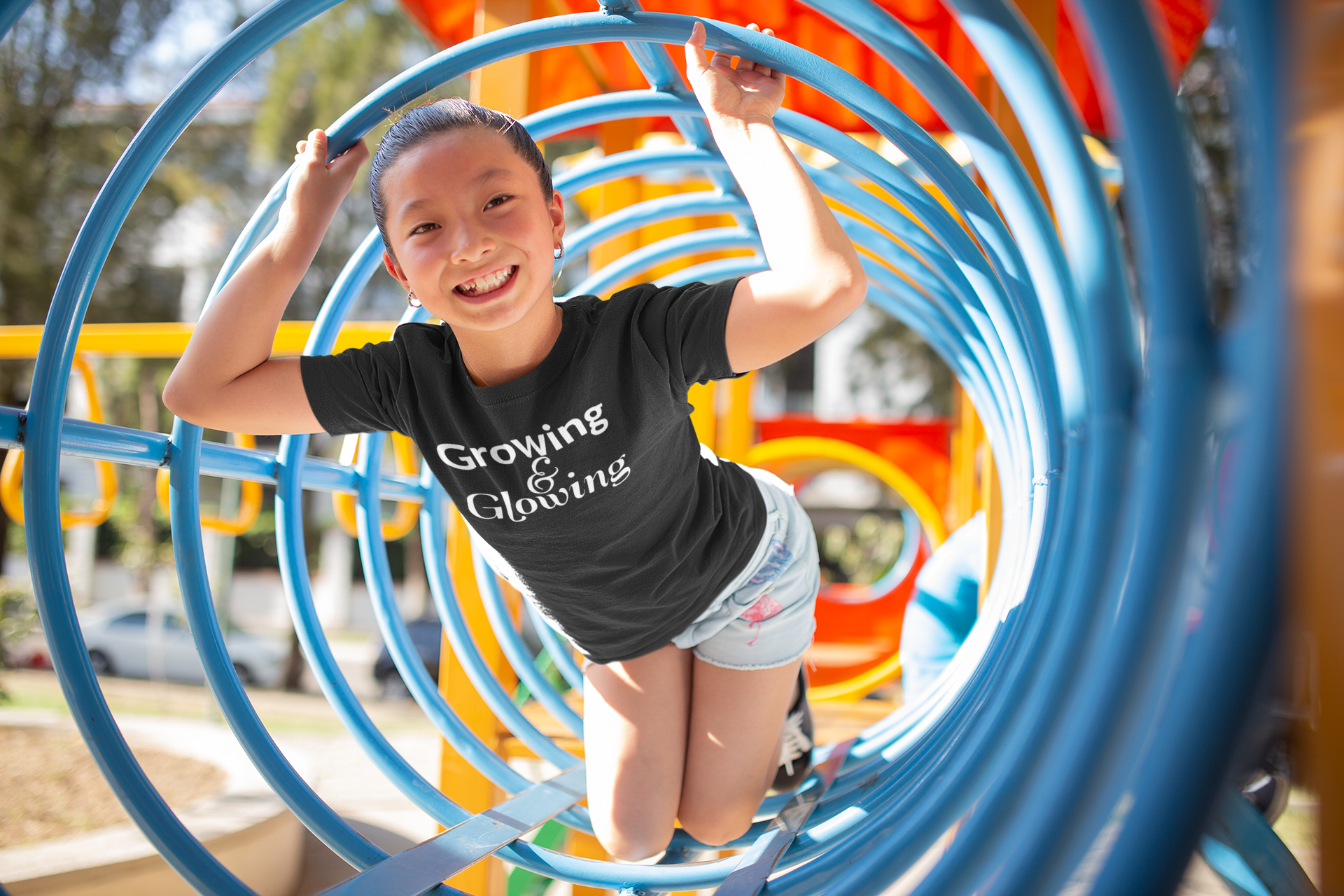 t-shirt-mockup-of-a-happy-girl-at-the-playground-a20959.png
