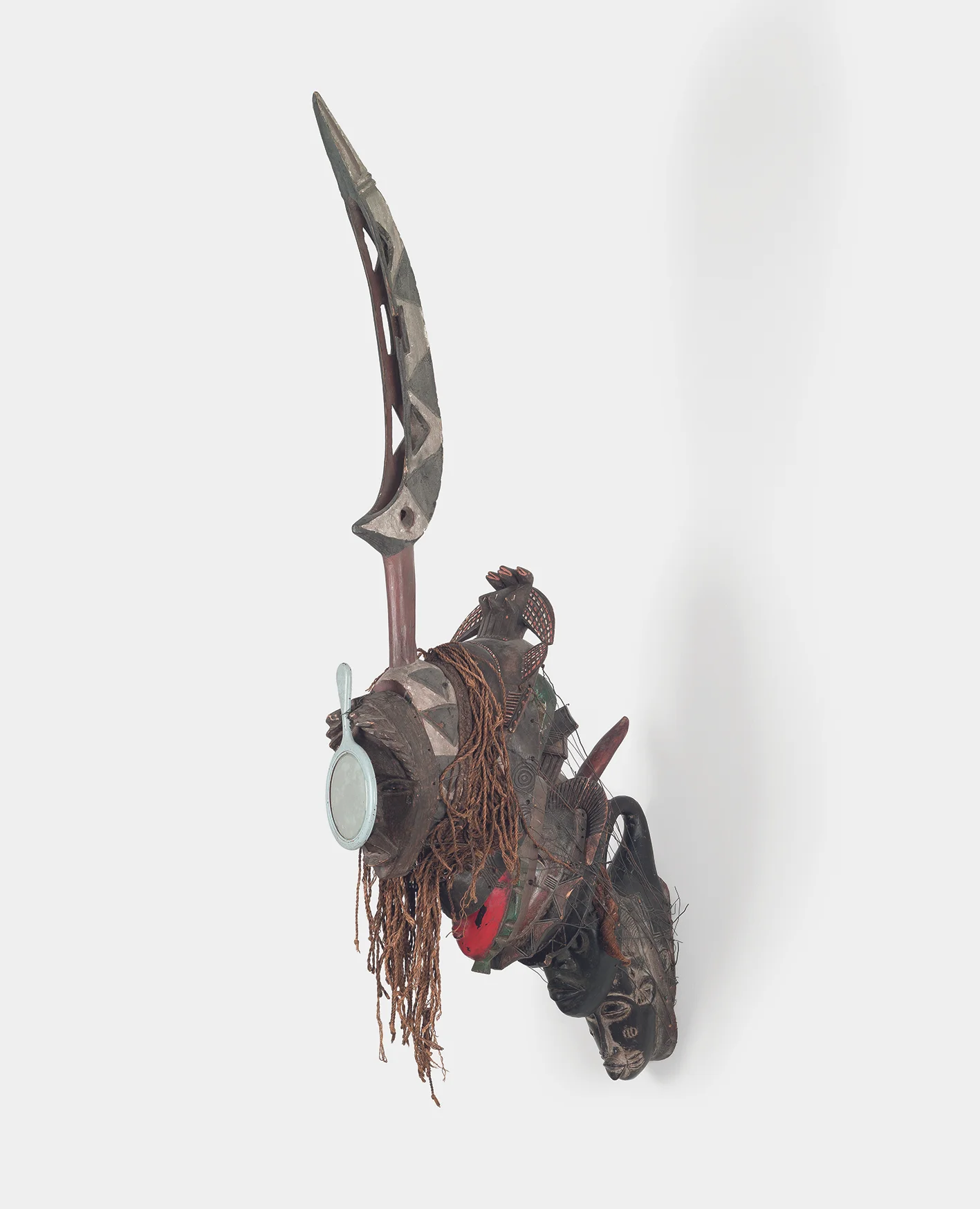 Untitled, 1996, African masks, mirror, wire, Photo Natalia Tsoukala