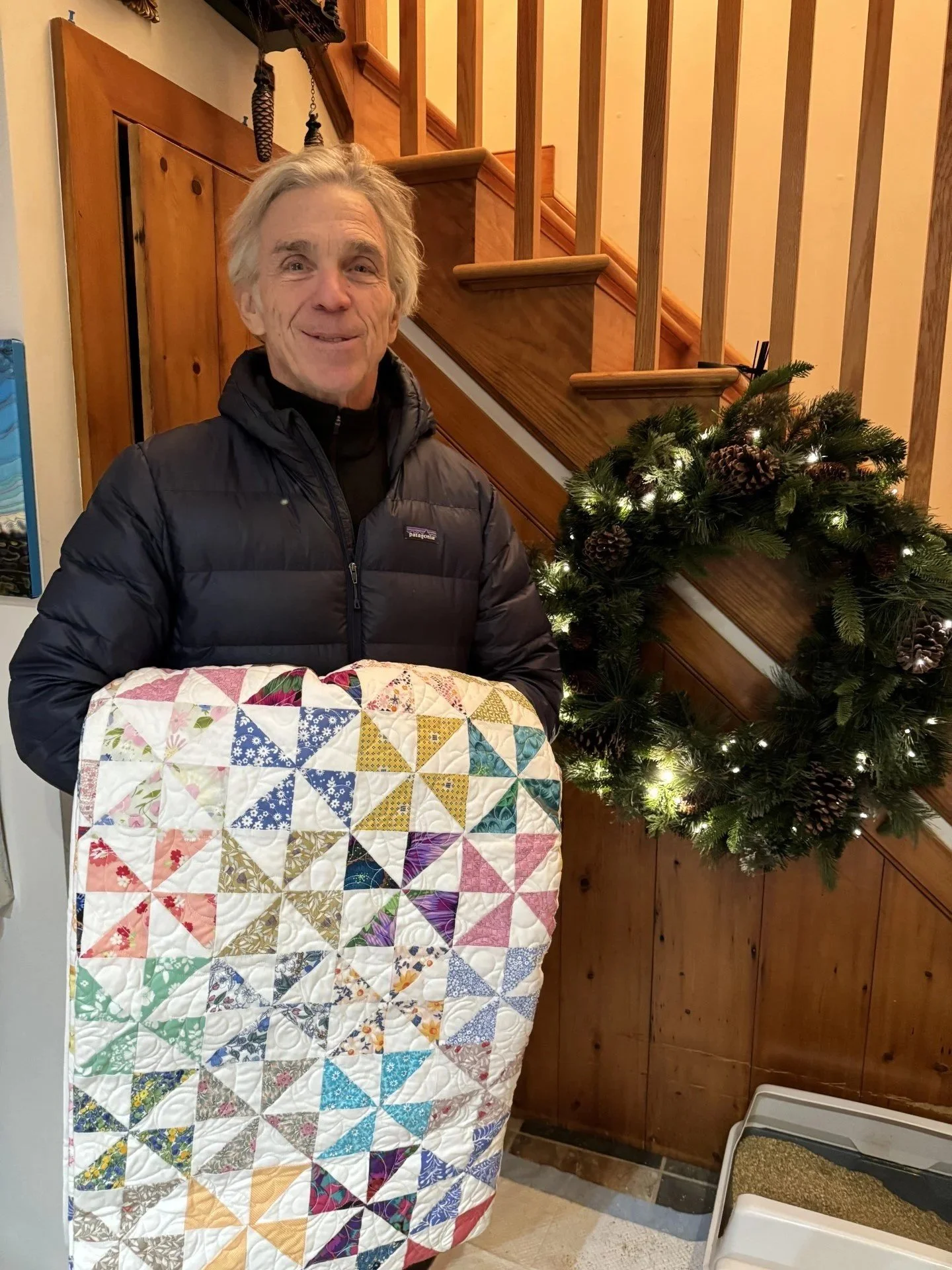 The Raffle Winner:  Michael Wooten.  He then graciously donated the quilt to a member fo the community recovering from a serious illness!