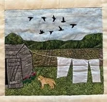 Geese flying over a field.jpg