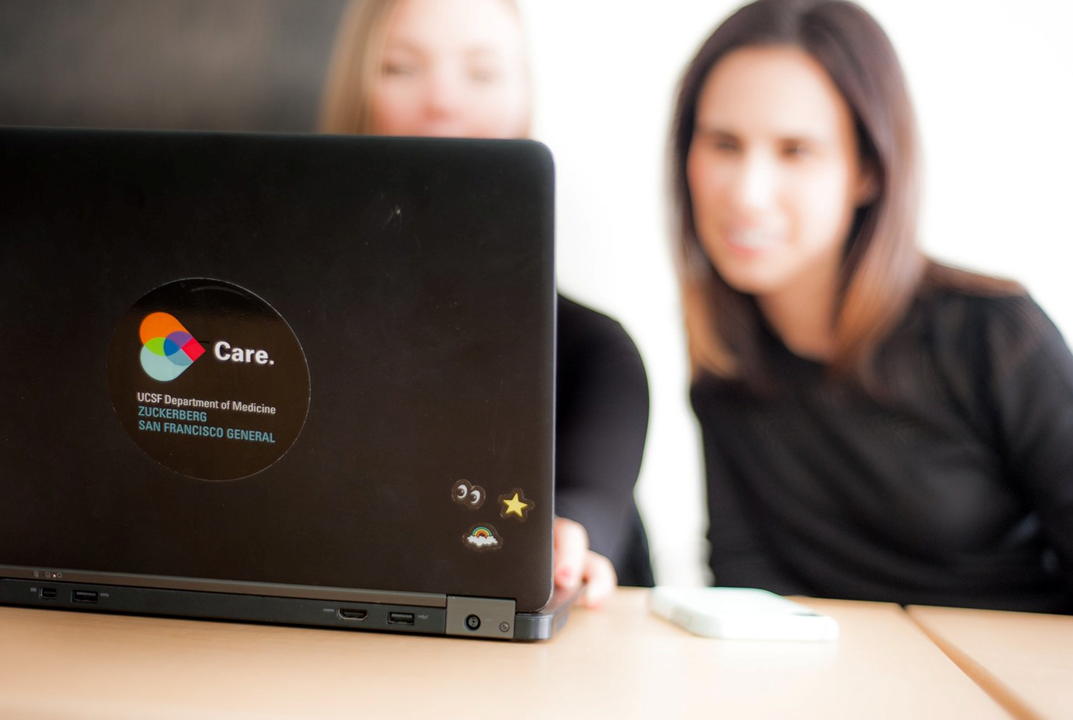 Image of women looking at a laptop.png