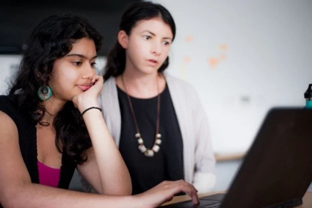 Image of two women looking at a computer.jpg