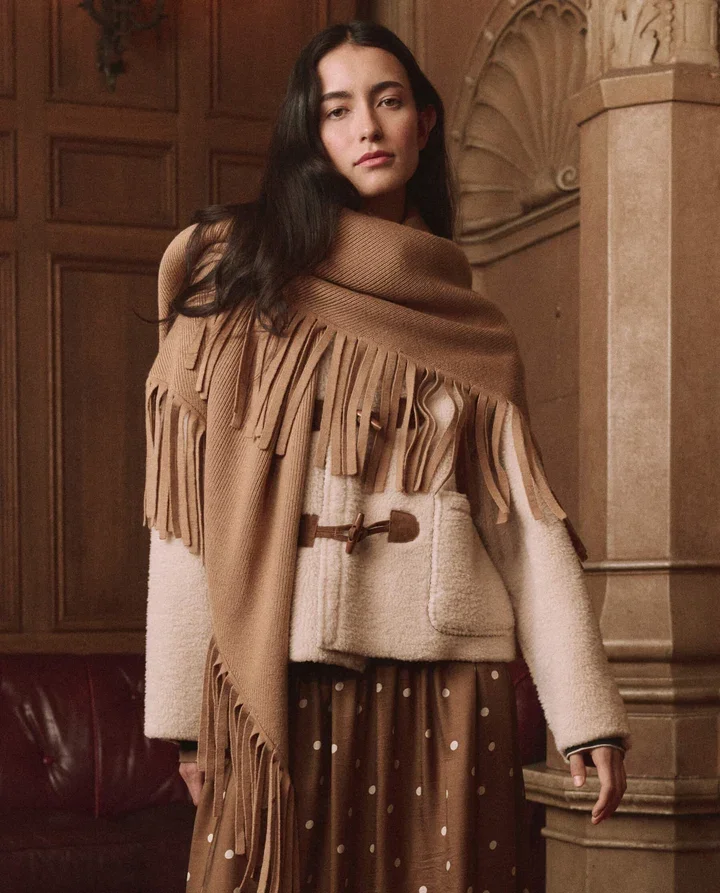 THE-GREAT-LOOK-33-THE-WOODSIDE-TOGGLE-COAT-CREAM-THE-CANARY-SKIRT-COPPER-BUBBLE-DOT-THE-BIG-SWEATER-FRINGE-SCARF-CAMEL-03027_720x.webp