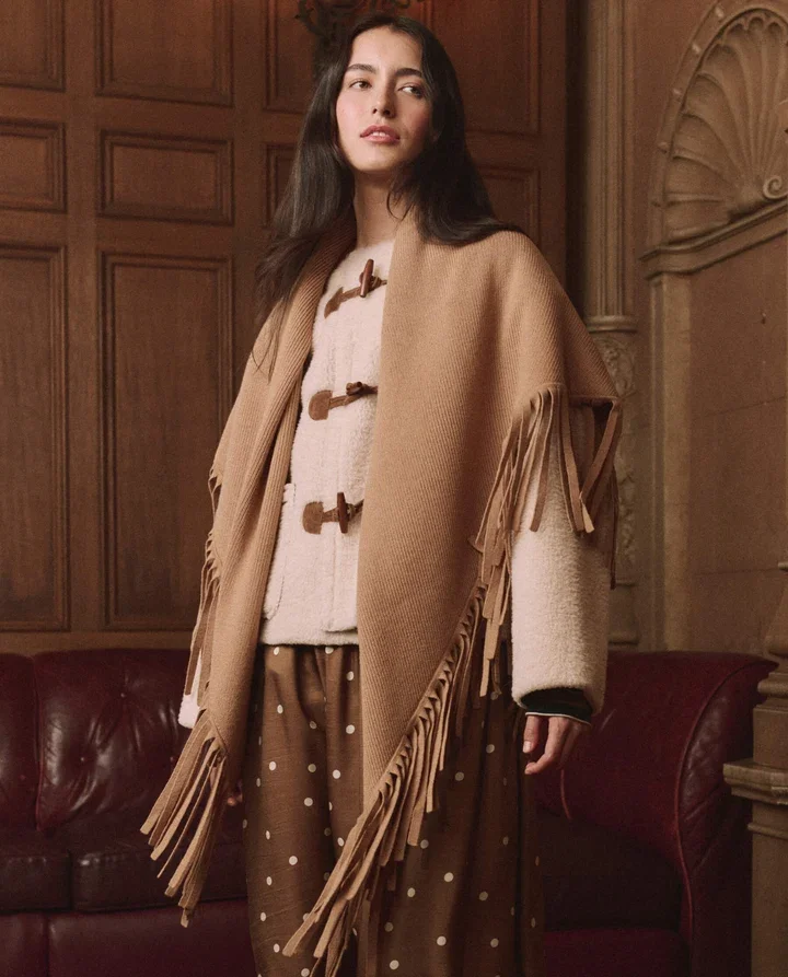 THE-GREAT-LOOK-33-THE-WOODSIDE-TOGGLE-COAT-CREAM-THE-CANARY-SKIRT-COPPER-BUBBLE-DOT-THE-BIG-SWEATER-FRINGE-SCARF-CAMEL-03013_1_720x.webp