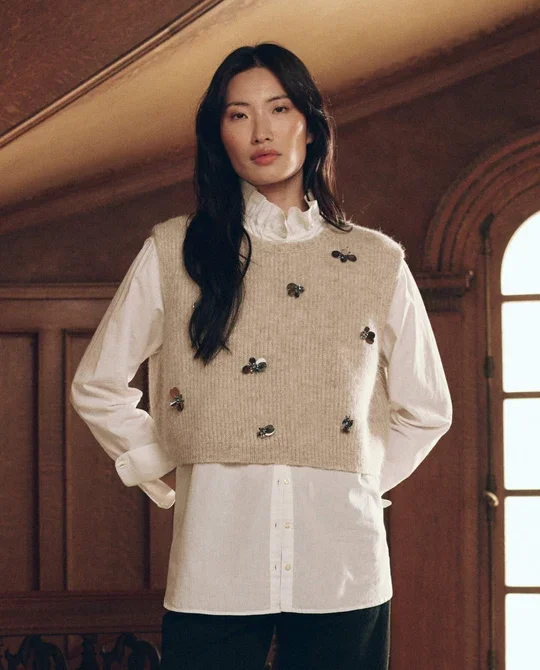 THE-GREAT-LOOK-38-THE-EMBELLISHED-BRUSHED-MELANGE-SWEATER-VEST-FAWN-THE-RUFFLE-NECK-SHIRT-WHITE-THE-WAYNE-JEAN-BLACK-1753_540x.webp (Copy)