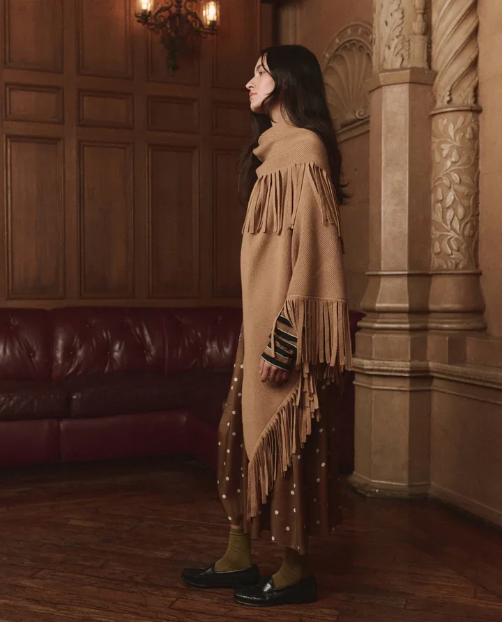 THE-GREAT-LOOK-23-THE-LONG-SLEEVE-RELAXED-CREW-CIGAR-STRIPE-THE-CANARY-SKIRT-COPPER-BUBBLE-DOT-THE-BIG-SWEATER-FRINGE-SCARF-CAMEL-02948_720x.webp