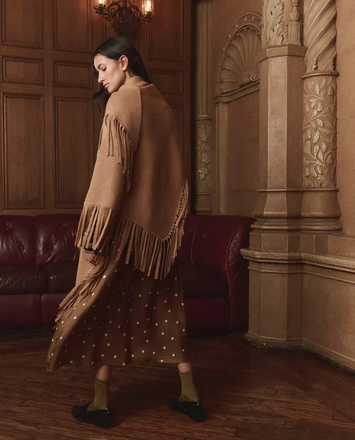 THE-GREAT-LOOK-23-THE-LONG-SLEEVE-RELAXED-CREW-CIGAR-STRIPE-THE-CANARY-SKIRT-COPPER-BUBBLE-DOT-THE-BIG-SWEATER-FRINGE-SCARF-CAMEL-02971_720x.webp
