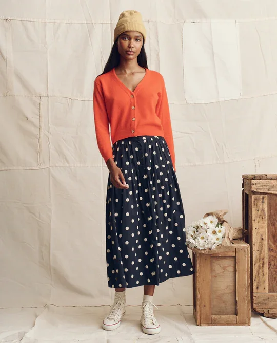 THE-GREAT-LOOK-116-THE-CASHMERE-TINY-V-NECK-CARDIGAN-HOT-ORANGE-THE-HIGHLAND-SKIRT-NAVY-W-CREAM-POLKA-DOT-2931_540x.webp (Copy)