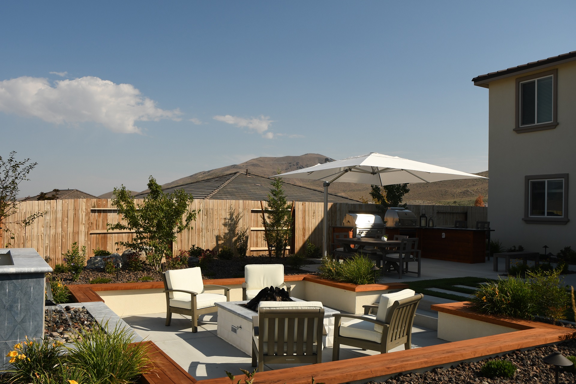 Reno, NV patio with stunning patio pavers and outdoor fireplace