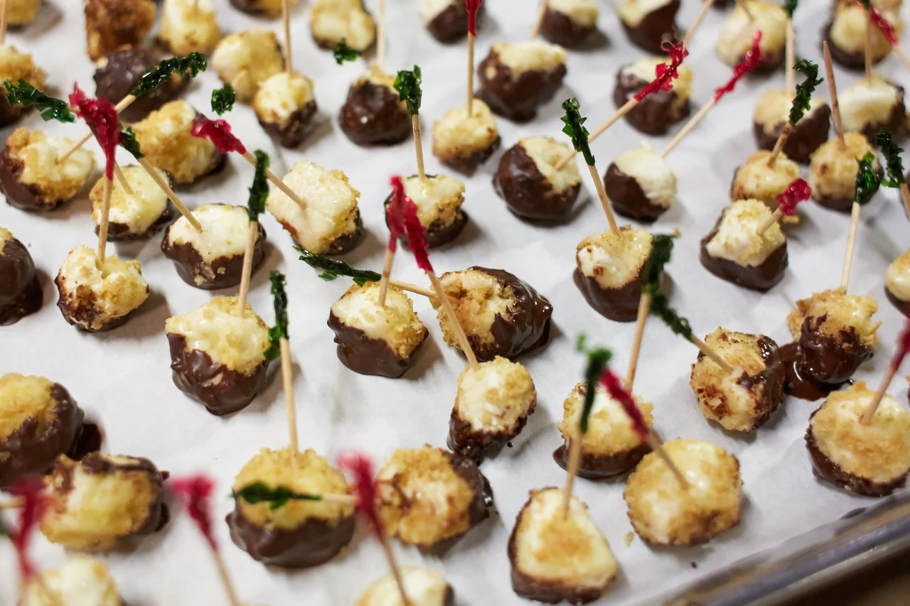  Neal Kennedy's creation for the ‘Perfect Bite’ competition at the Cheesemonger Invitational is made with French Chabichou du Poitou goat cheese dipped in Valrhona 68% dark chocolate and coated with Effie's oat cakes.  STEVE REMICH FOR THE WALL STREE