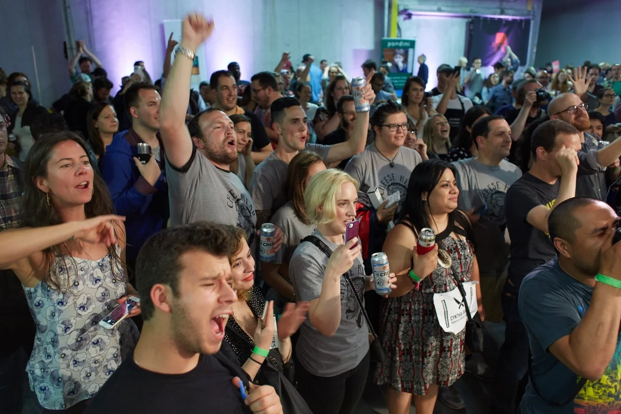  The crowd cheers on competitors in a contest pairing cheese and beer.  STEVE REMICH FOR THE WALL STREET JOURNAL 