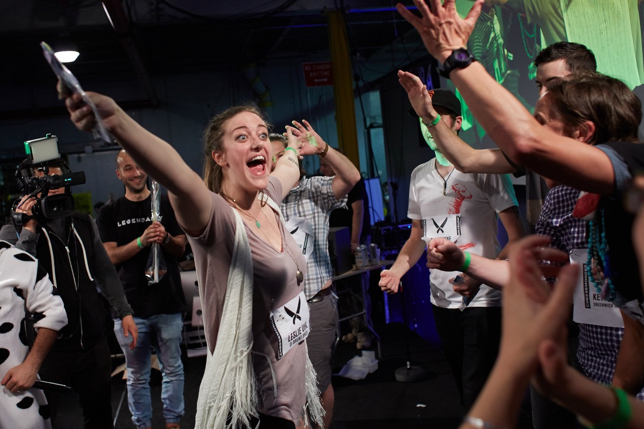  Leslie Uhl of Di Bruno Bros. in Philadelphia celebrates after taking second place in the Cheesemonger Invitational competition.  STEVE REMICH FOR THE WALL STREET JOURNAL 